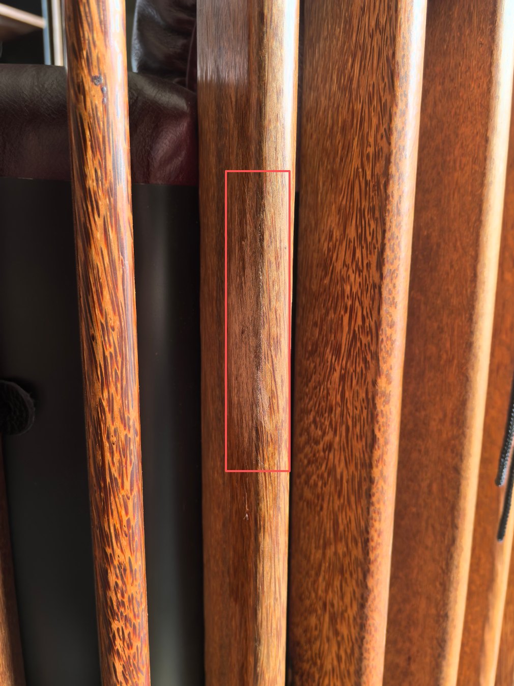 wood-b-rejected Palmwood rail marked for defect review