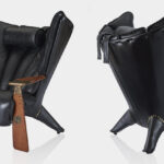 Verite Armchair side view with sculptural Palmwood frame