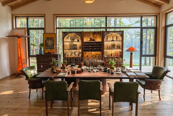 Nordic natural tea room with Pacific Green furniture and Isle D'Palm Armchair as the centrepiece